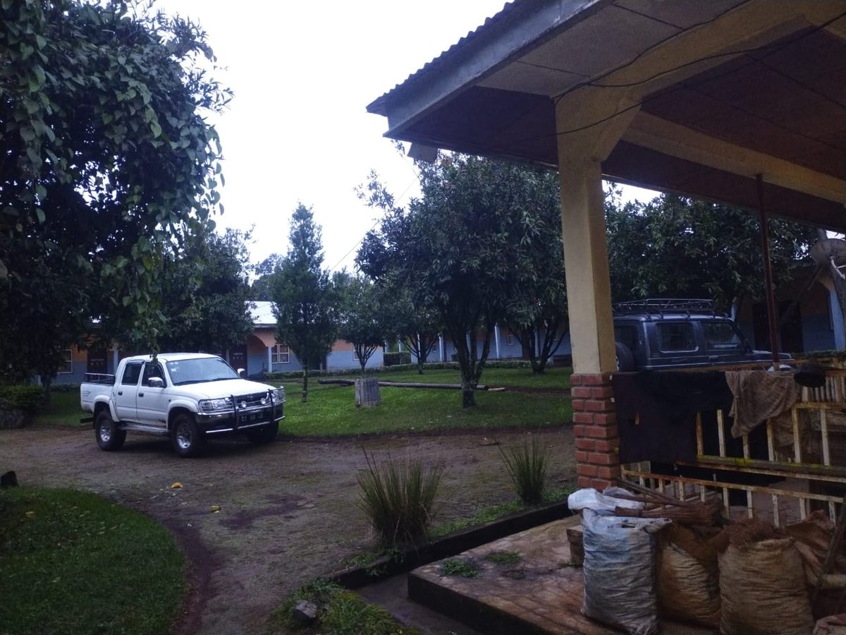 The Centre compound with a field vehicle and store
